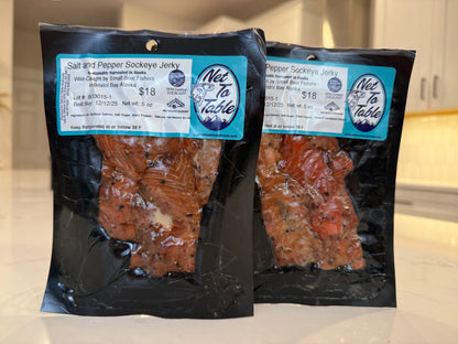 Two packages of salt and pepper sockeye salmon jerky from Net to Table, wild-caught Bristol Bay Alaska, 5oz vacuum-sealed bags